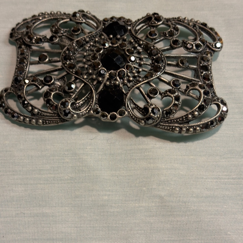 Elegant Black and Silver Brooch